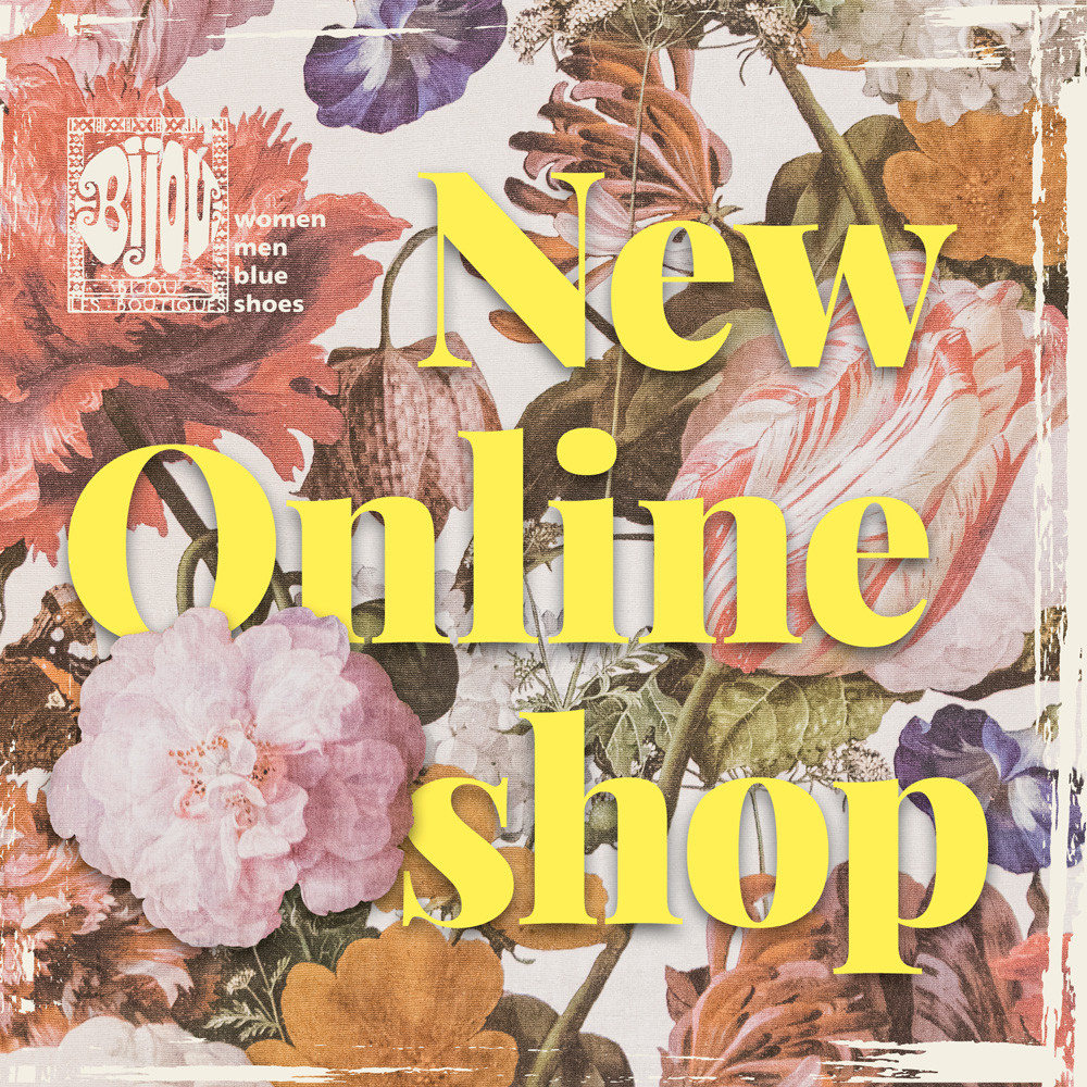 Text New Onlineshop in Gelb, Blumentapete als Hintergrund