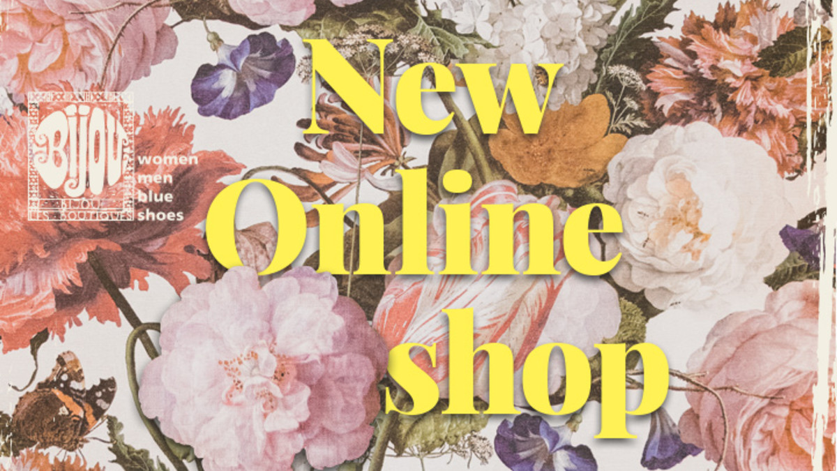 Text New Onlineshop in Gelb, Blumentapete als Hintergrund
